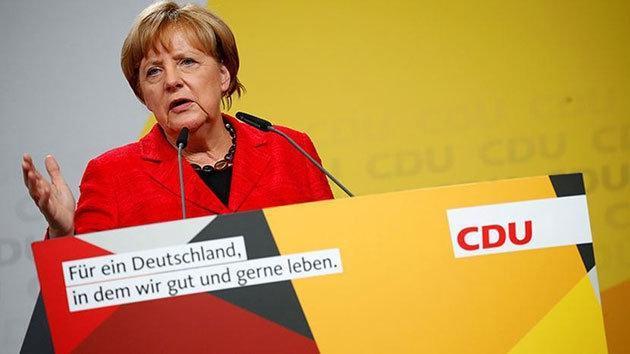 Almanyada zafer Merkelin