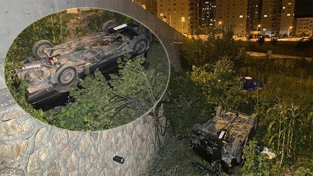 Kontrolden çıkan araç 7 metrelik istinat duvarından bahçeye uçtu)