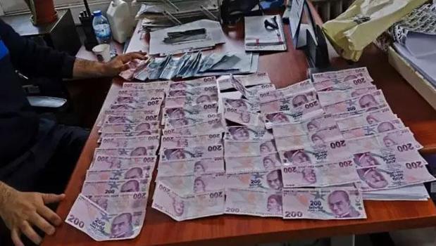 Dilencinin üzerinden çıkan para ekipleri şaşkına çevirdi)