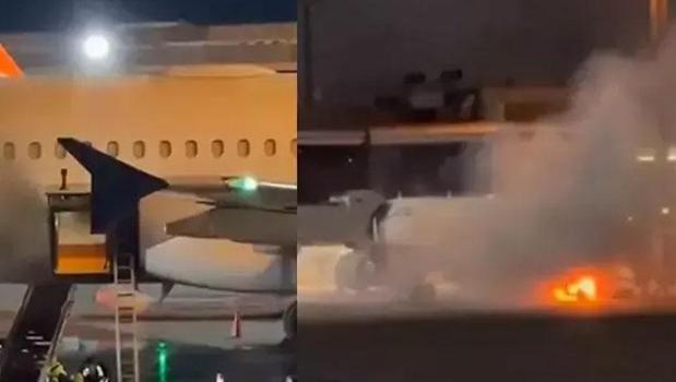 Brezilya'da pistteki bagaj yükleme aracında yangın: Yolcu uçağını duman sardı)