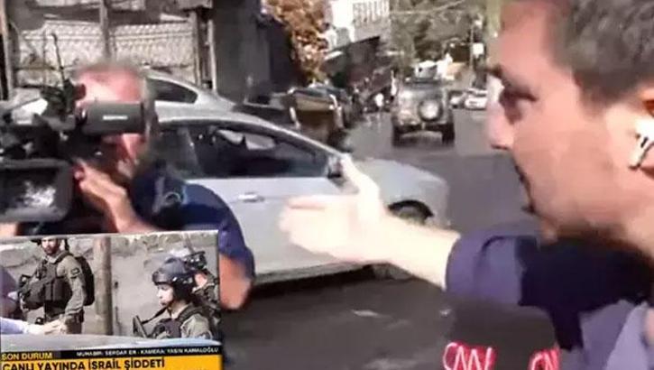 İsrail polisi Türk gazetecinin kamerasını kırdı