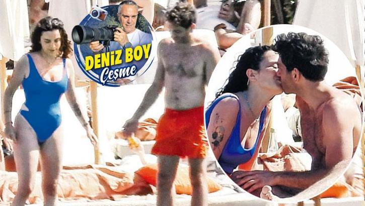 Plajda birbirlerini öpücüklere boğdular!