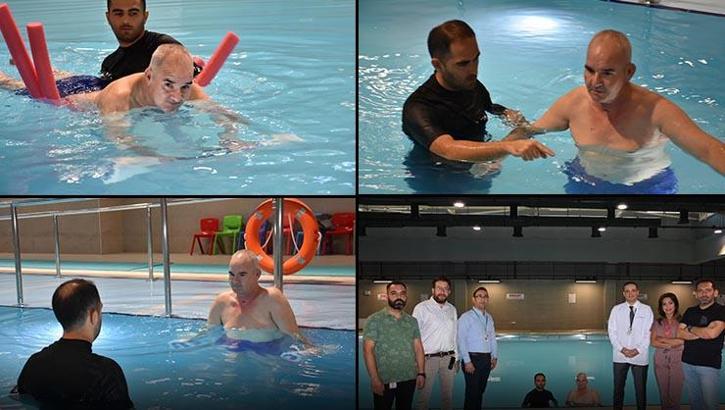 Yürüme yetisini kaybeden adam şifayı İzmir'de buldu! Havuza girerek yeniden hayata tutundu