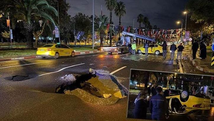 Vatan Caddesi'nde kuvvetli yağış sonrası yol çöktü, taksi takla attı