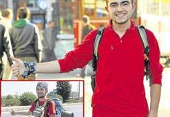 Otostop yaparak dünyayı geziyor