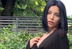 Merve Boluğur yamuk jartiyeri ve dağınık saçları ile dikkat çekti