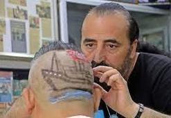 Dünya rekortmeni berber 7 saat uğraştı