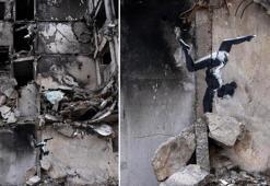 Banksy Ukrayna'da: Yıkılan binaya anlamlı dokunuş