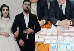 Düğünde geline kilolarca altın, damada milyonlarca lira takıldı