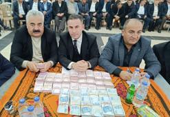 Aşiret düğününde 100 koyun kesildi: Geline kilolarca altın, damada ise milyonlarca lira takıldı
