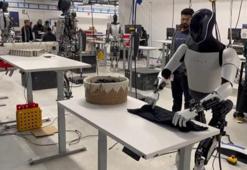 Elon Musk'ın robotu Optimus tişörtü böyle katladı