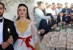 Van'daki aşiret düğününde takı yarışı! Binlerce lira ve altın takıldı