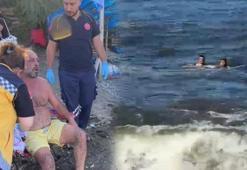 Uyarılara aldırmadı denize girdi! Kendi kurtuldu onu kurtaran dalgalara kapıldı