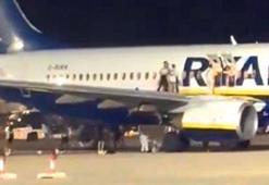 Uçakta yangın alarmı izdihamı