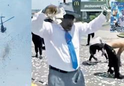 Son arzusuyla gökten para yağdırdı