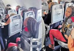 Taşkınlık yapan yolcu koltuğa bantlandı