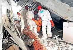 Enkaz altına elle müdahale