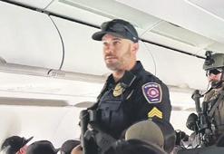 Bomba notu uçağı indirtti