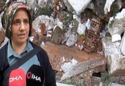 Deprem gibi! İstinat duvarı yan binanın üzerine düştü