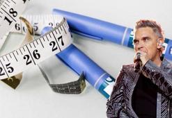 Robbie Williams’tan korkutan itiraf: Seyircileri göremiyorum! Zayıflama verme iğneleri görme kaybına neden olur mu?