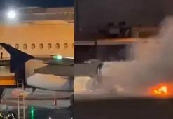 Brezilya'da pistteki bagaj yükleme aracında yangın: Yolcu uçağını duman sardı