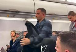 Uçakta ilginç anlar! Kalkışı durdurup helallik istedi