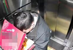 Skandal teslimat! Kurye pizzayı götürmeden yedi, ardından asansöre tuvaletini yaptı
