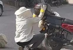 Arılar yol ortasında motosikleti kuşattı! Görenler cep telefonuna sarıldı