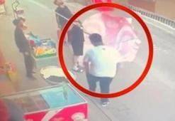 Nefeslerin tutulduğu anlar! Yavru kediye şemsiyeyle hayat oldular