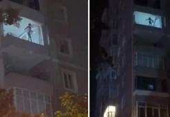 Balkonda tehlikeli dans! Yaptıklarıyla mahalleyi ayağa kaldırdı