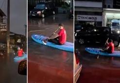 Sokaklar göle dönünce SUP tahtasıyla gezintiye çıktı!