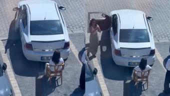 Sandalye ile park alanı kapattı! Sürücü tepki gösterdi