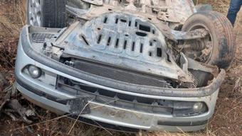 Takla atan otomobilden yara almadan kurtuldu