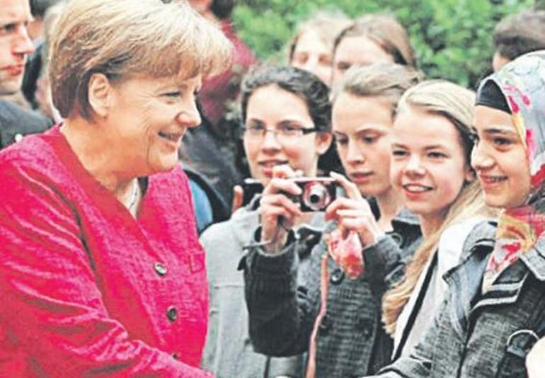 Göçmenler bizde ödül Merkelde