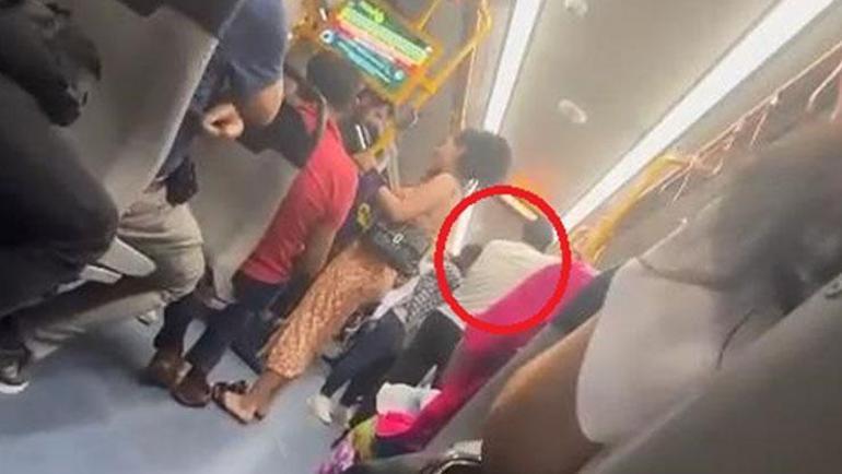 Metroda eşini başka bir kadınla görünce ortalığı birbirine kattı