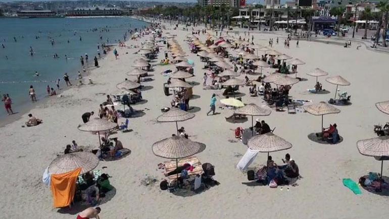 Sıcak havayı da fırsat bilerek plajlara akın ettiler