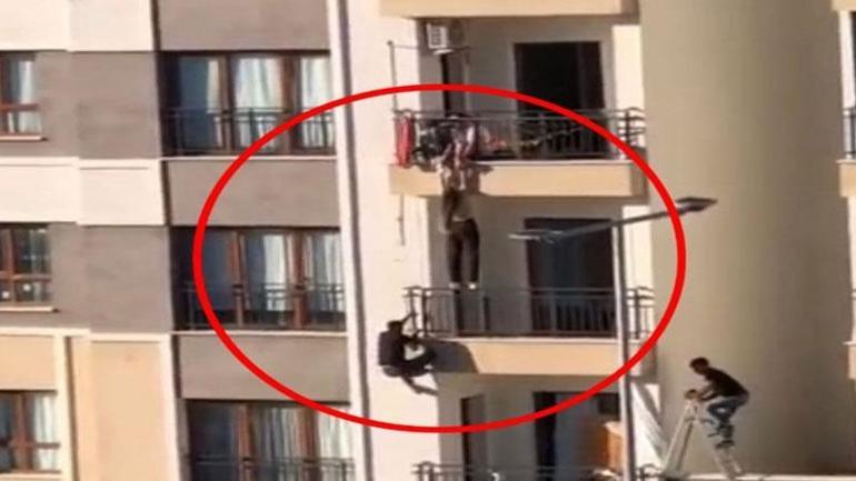 Balkondan düşmek üzere olan çocuğu böyle kurtardı